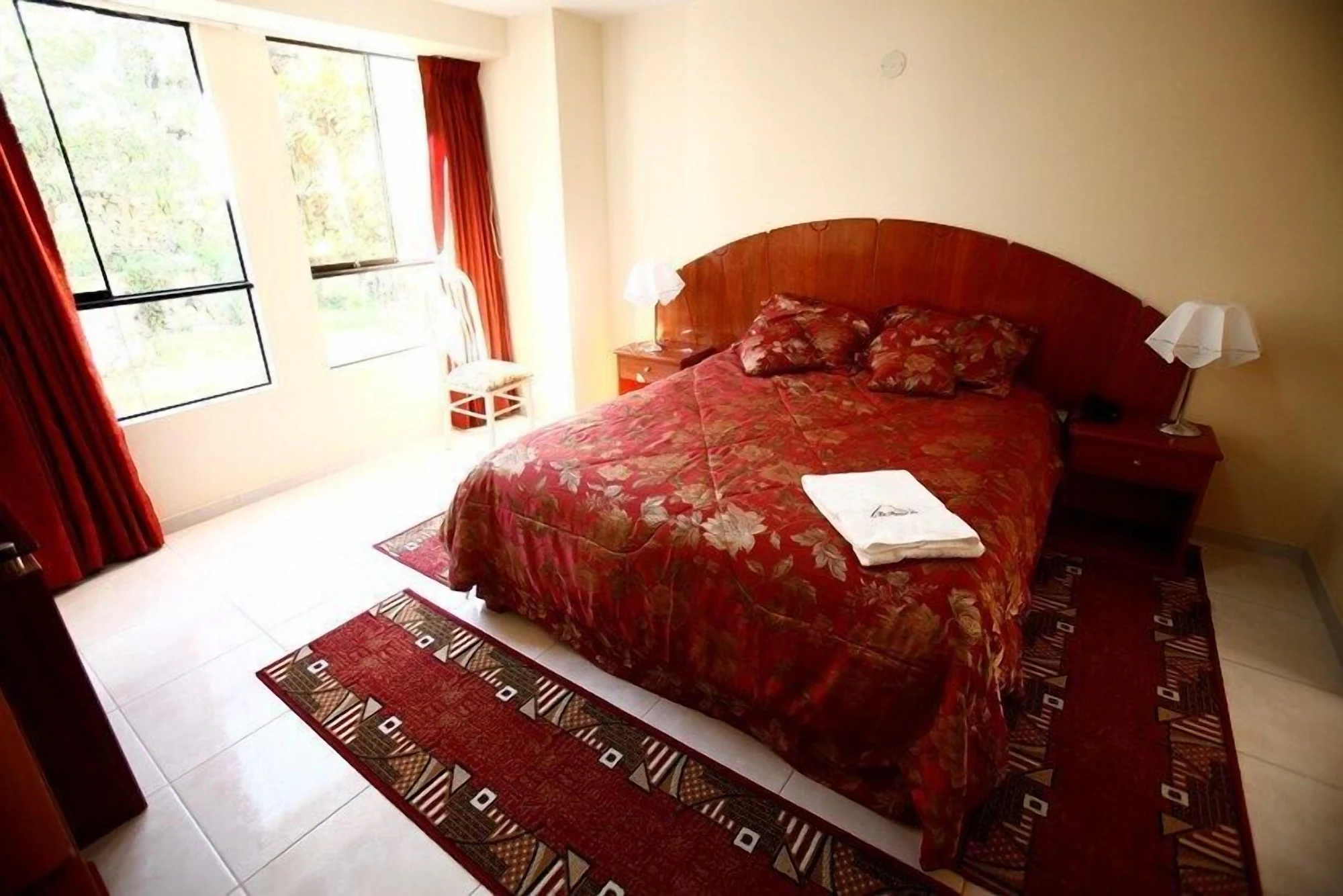 Deluxe Double room with balcony and with garden view full double bed