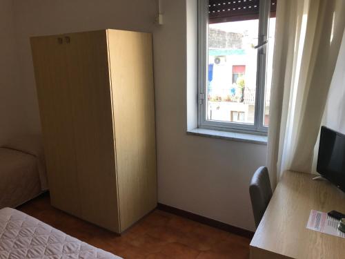Economy Triple room with courtyard view